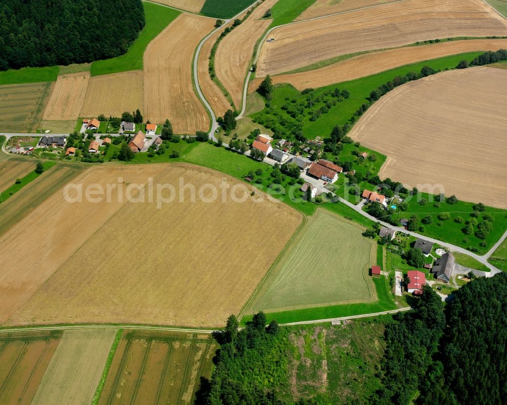 Oberochsenbach from the bird's eye view: Agricultural land and field boundaries surround the settlement area of the village in Oberochsenbach in the state Baden-Wuerttemberg, Germany