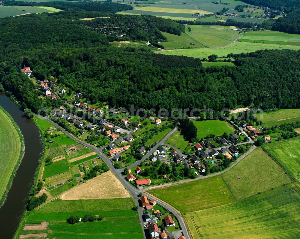 Aerial image Oberode - Agricultural land and field boundaries surround the settlement area of the village in Oberode in the state Lower Saxony, Germany