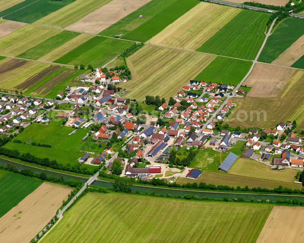 Oberopfingen from above - Agricultural land and field boundaries surround the settlement area of the village in Oberopfingen in the state Baden-Wuerttemberg, Germany