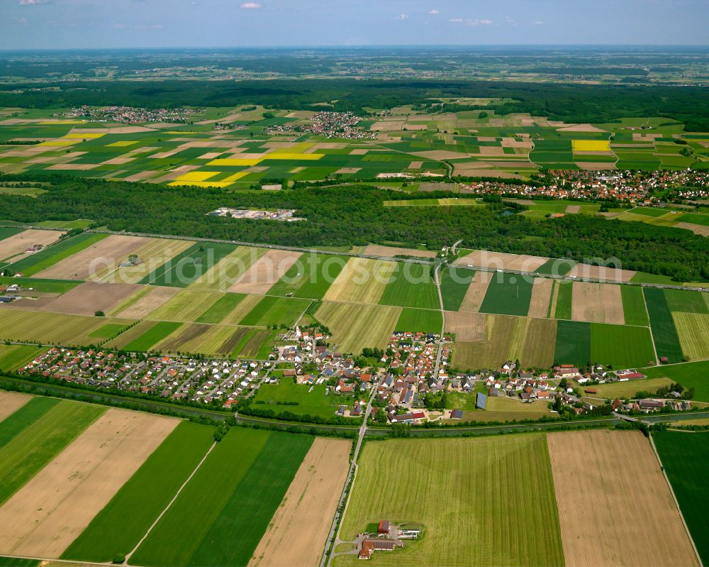 Aerial image Oberopfingen - Agricultural land and field boundaries surround the settlement area of the village in Oberopfingen in the state Baden-Wuerttemberg, Germany