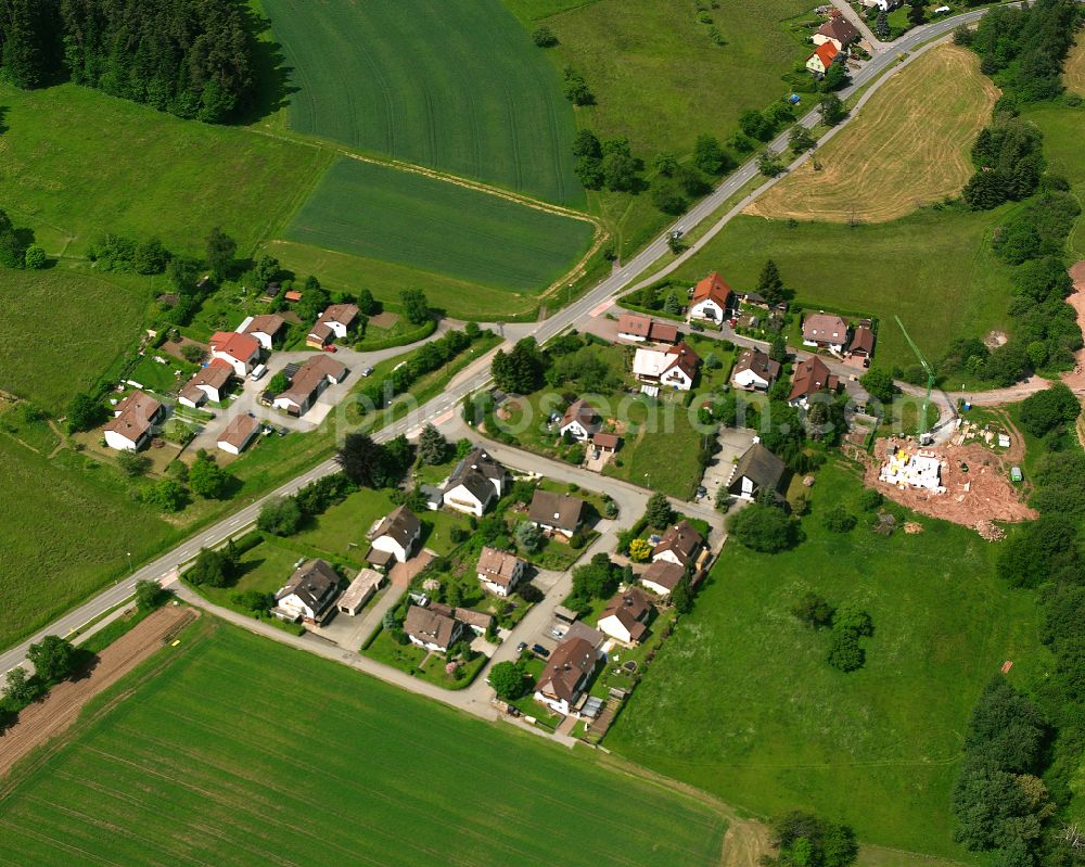 Aerial image Oberreichenbach - Agricultural land and field boundaries surround the settlement area of the village in Oberreichenbach in the state Baden-Wuerttemberg, Germany