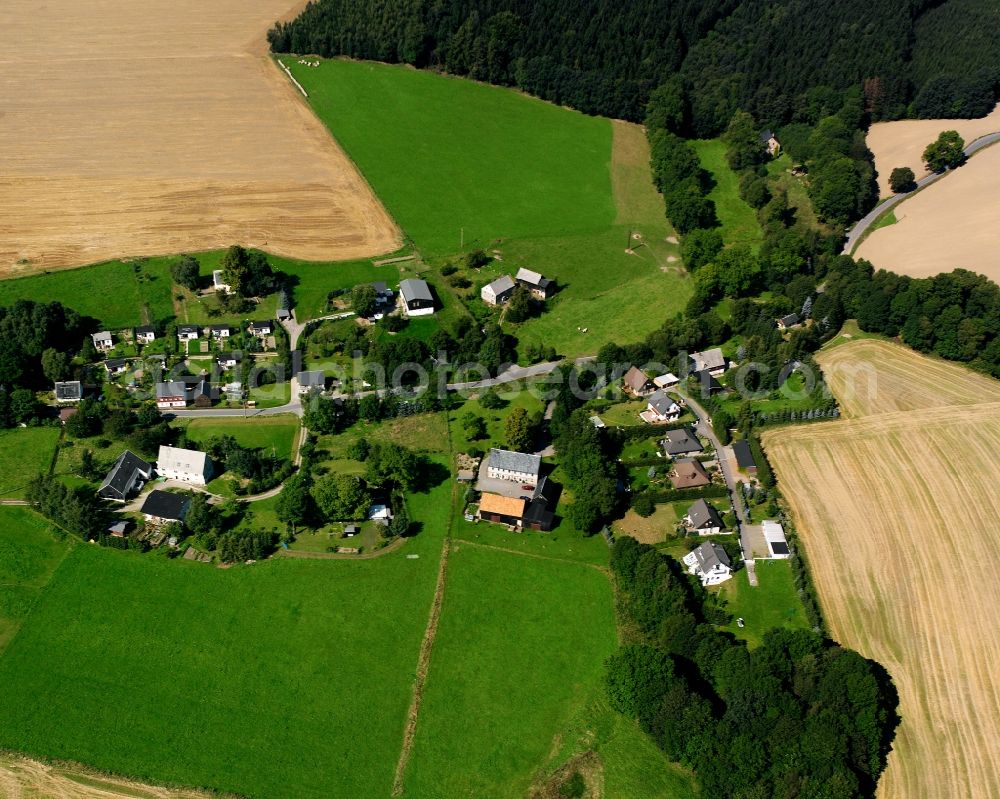 Aerial image Oberreichenbach - Agricultural land and field boundaries surround the settlement area of the village in Oberreichenbach in the state Saxony, Germany