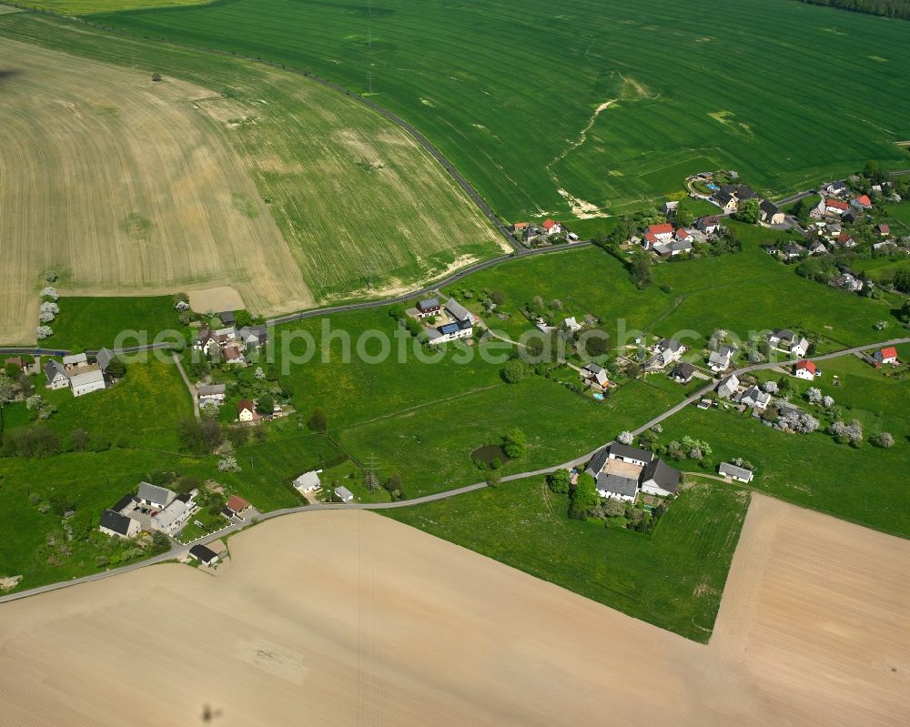 Oberrossau from above - Agricultural land and field boundaries surround the settlement area of the village in Oberrossau in the state Saxony, Germany