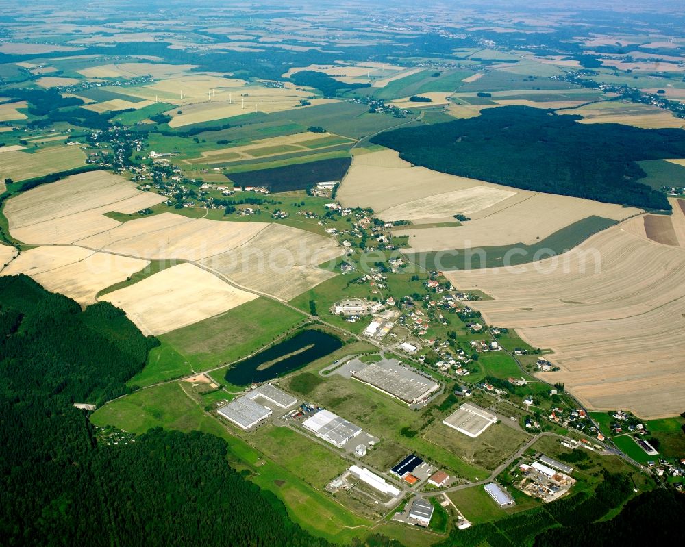 Oberrossau from above - Agricultural land and field boundaries surround the settlement area of the village in Oberrossau in the state Saxony, Germany