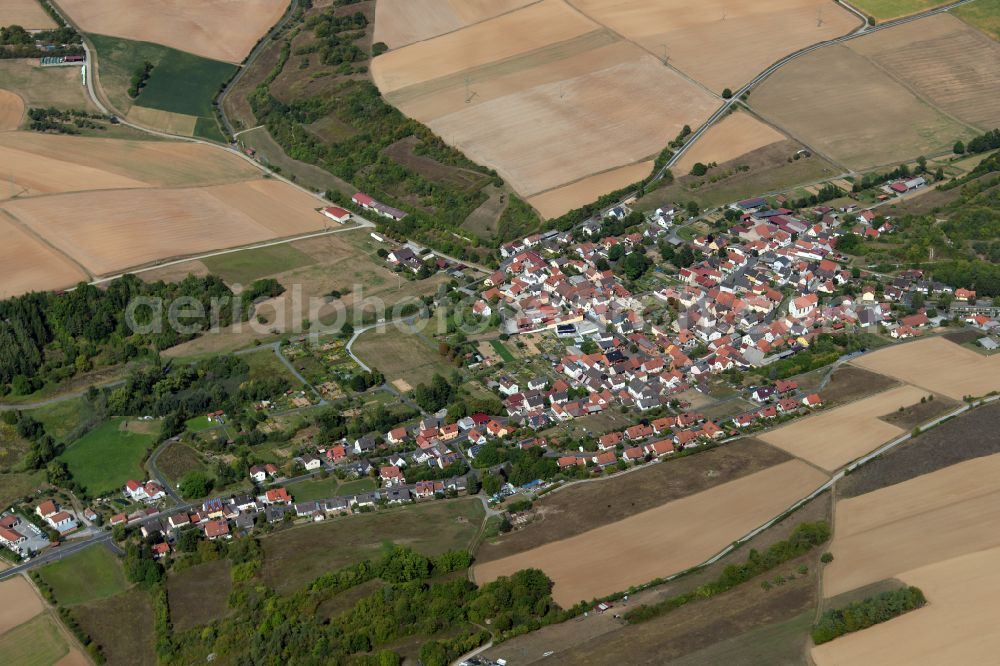 Aerial image Obersfeld - Agricultural land and field boundaries surround the settlement area of the village in Obersfeld in the state Bavaria, Germany