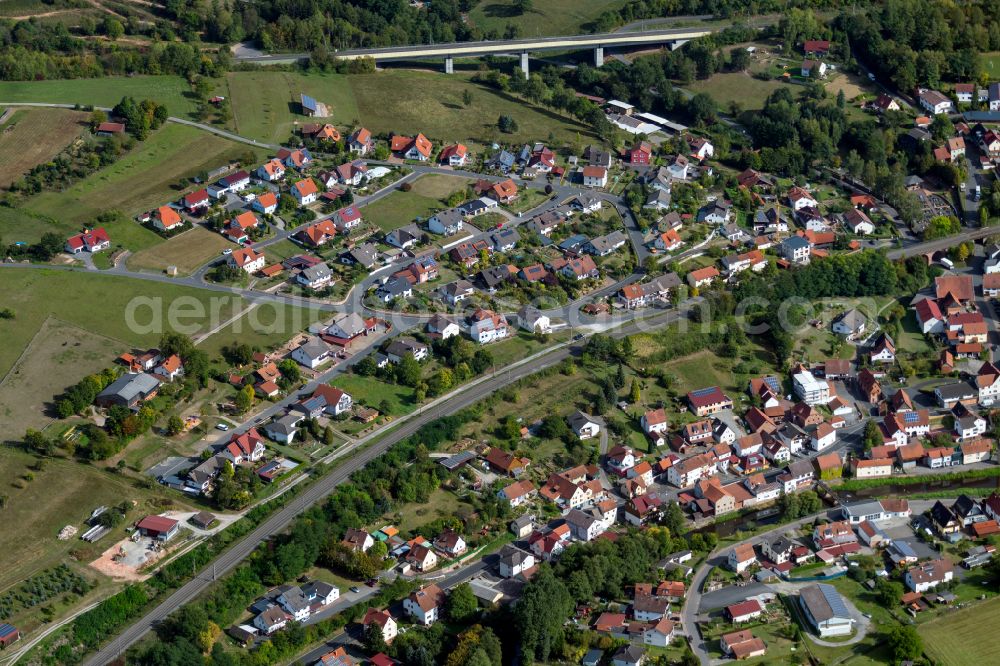 Aerial image Obersinn - Agricultural land and field boundaries surround the settlement area of the village in Obersinn in the state Bavaria, Germany