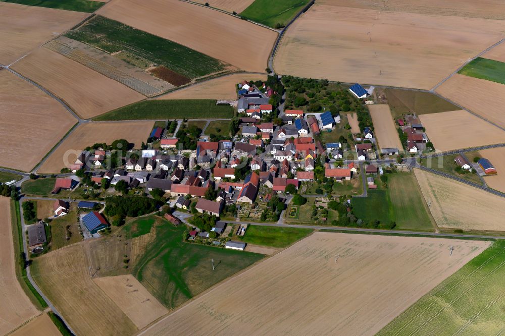 Aerial image Oesfeld - Agricultural land and field boundaries surround the settlement area of the village in Oesfeld in the state Bavaria, Germany