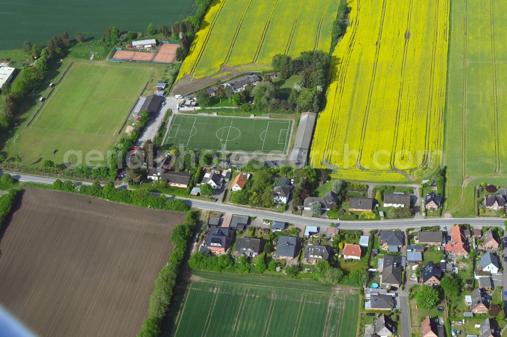 Aerial image Ohldörp - Agricultural land and field boundaries surround the settlement area of the village in Ohldörp in the state Schleswig-Holstein, Germany