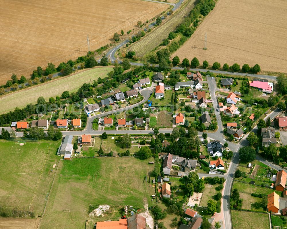 Aerial photograph Ohlendorf - Agricultural land and field boundaries surround the settlement area of the village in Ohlendorf in the state Lower Saxony, Germany