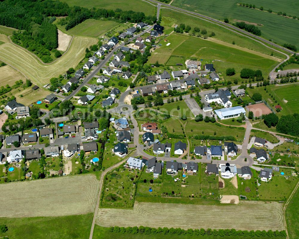 Aerial photograph Oppenhausen - Agricultural land and field boundaries surround the settlement area of the village in Oppenhausen in the state Rhineland-Palatinate, Germany