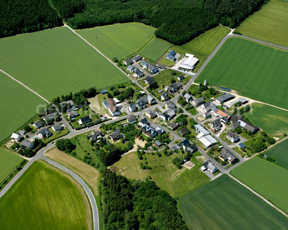 Aerial image Oppertshausen - Agricultural land and field boundaries surround the settlement area of the village in Oppertshausen in the state Rhineland-Palatinate, Germany