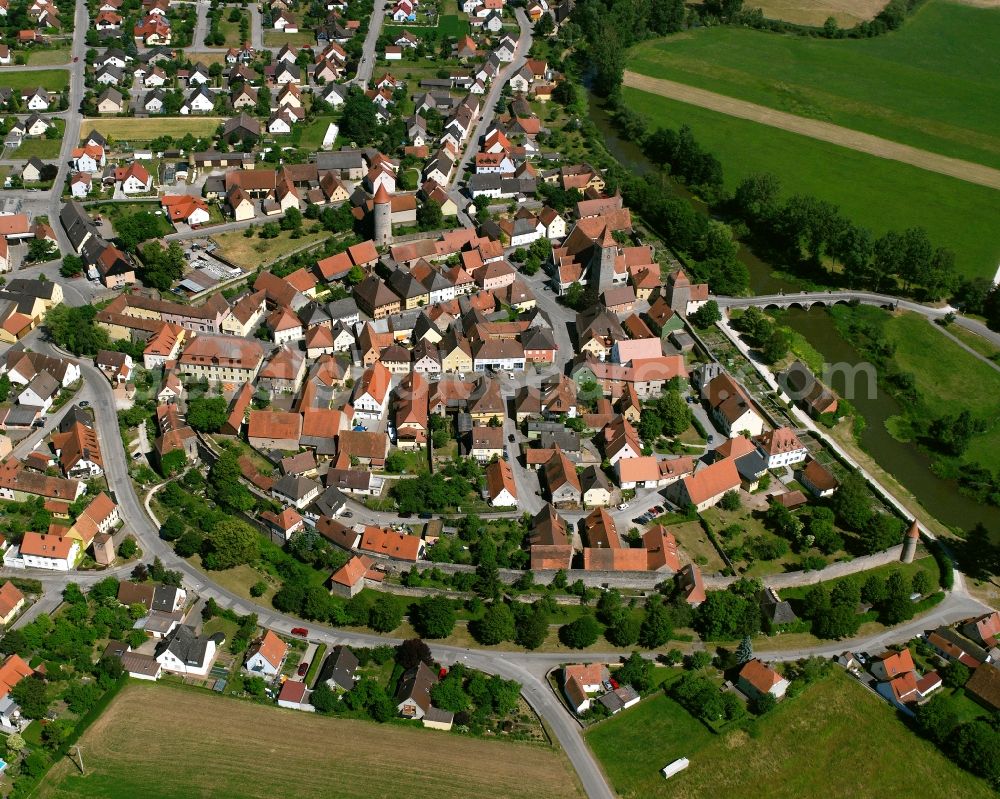 Aerial photograph Ornbau - Agricultural land and field boundaries surround the settlement area of the village in Ornbau in the state Bavaria, Germany