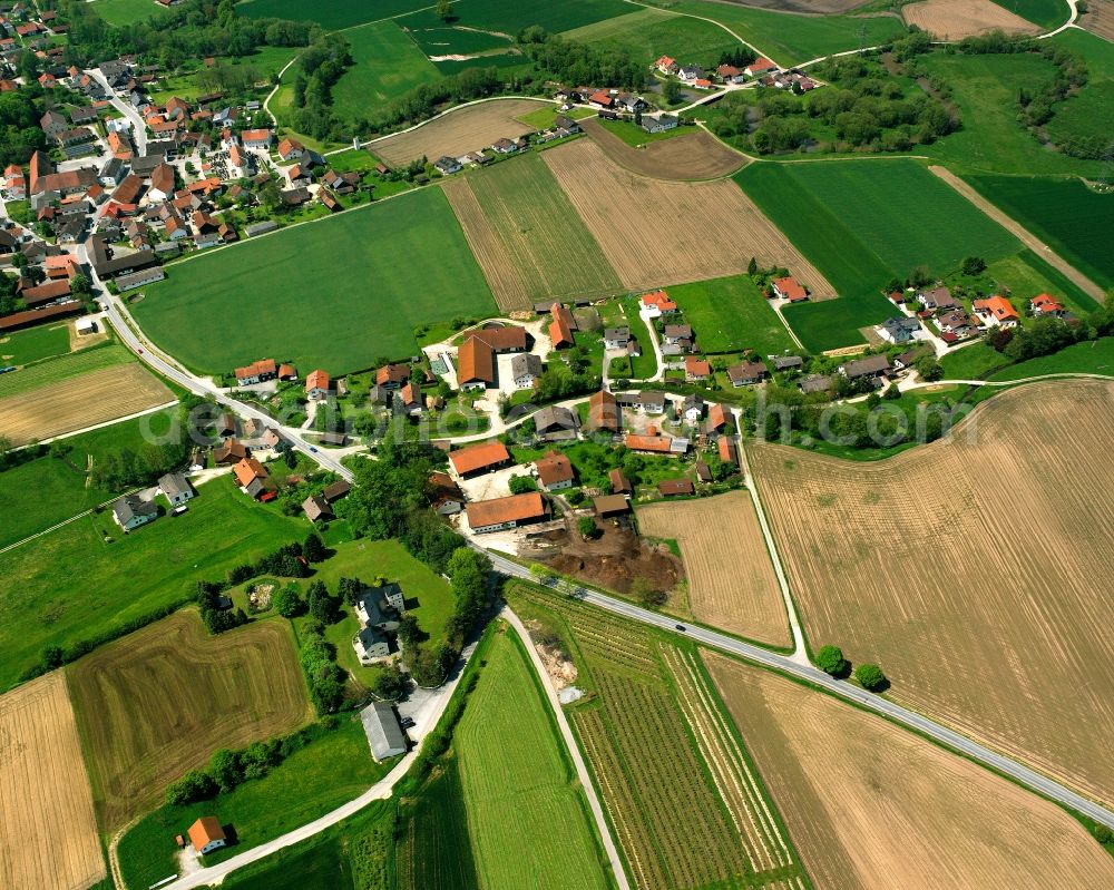 Aerial image Osterndorf - Agricultural land and field boundaries surround the settlement area of the village in Osterndorf in the state Bavaria, Germany