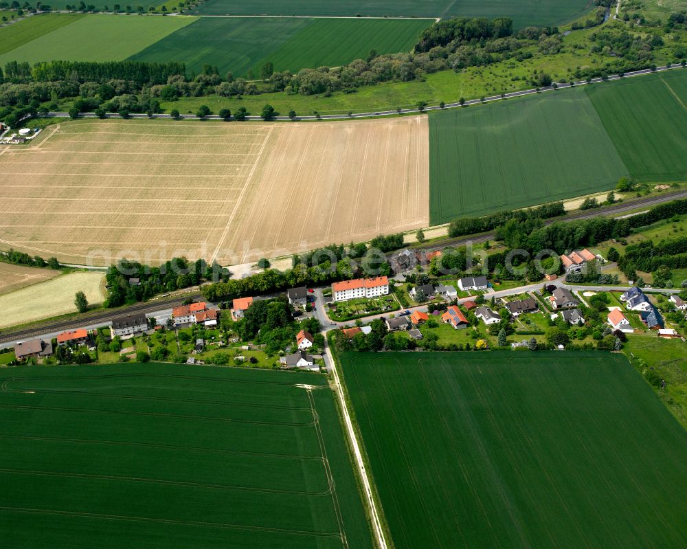 Aerial photograph Othfresen - Agricultural land and field boundaries surround the settlement area of the village in Othfresen in the state Lower Saxony, Germany