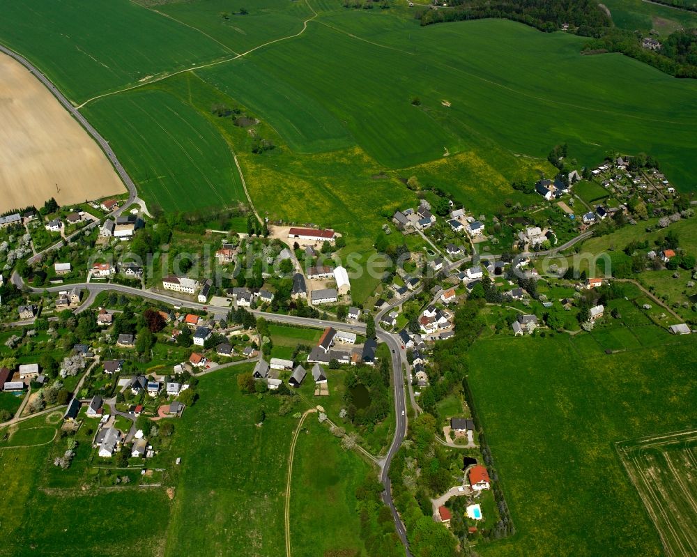 Aerial photograph Ottendorf - Agricultural land and field boundaries surround the settlement area of the village in Ottendorf in the state Saxony, Germany