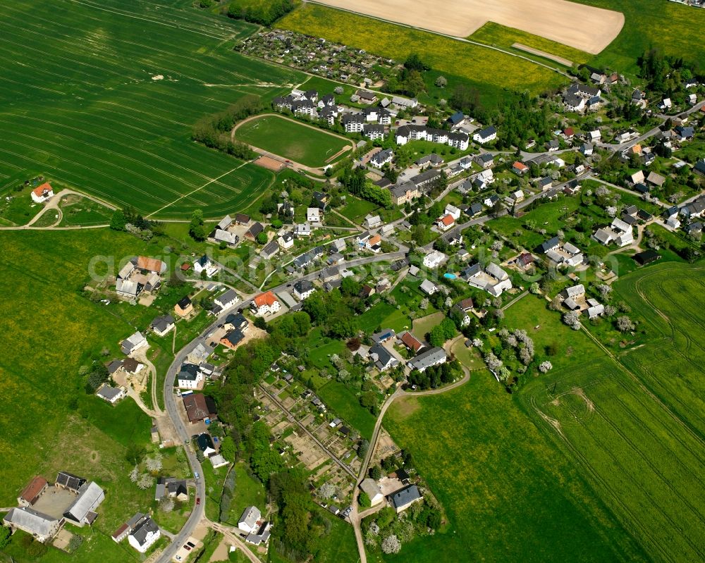 Aerial image Ottendorf - Agricultural land and field boundaries surround the settlement area of the village in Ottendorf in the state Saxony, Germany