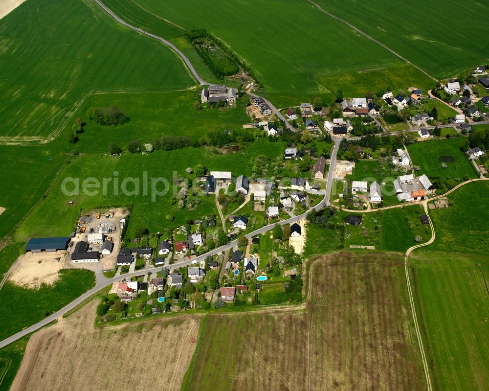 Aerial image Ottendorf - Agricultural land and field boundaries surround the settlement area of the village in Ottendorf in the state Saxony, Germany