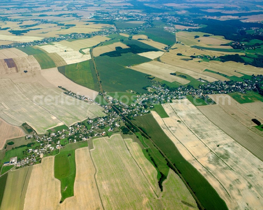 Aerial photograph Ottendorf - Agricultural land and field boundaries surround the settlement area of the village in Ottendorf in the state Saxony, Germany