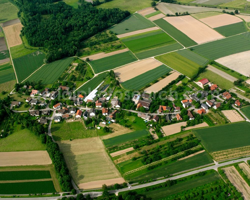 Ottersweier from above - Agricultural land and field boundaries surround the settlement area of the village in Ottersweier in the state Baden-Wuerttemberg, Germany