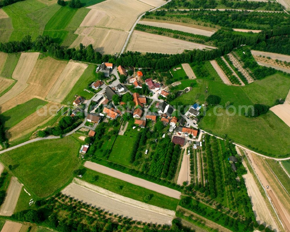 Ottersweier from the bird's eye view: Agricultural land and field boundaries surround the settlement area of the village in Ottersweier in the state Baden-Wuerttemberg, Germany