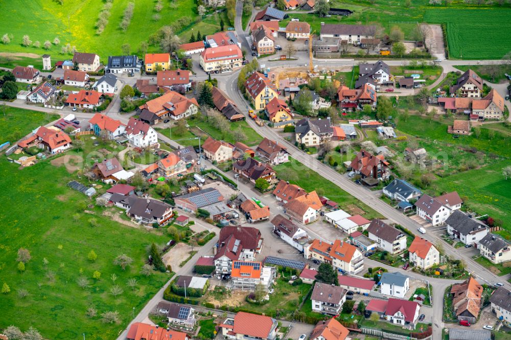 Ottoschwanden from the bird's eye view: Agricultural land and field boundaries surround the settlement area of the village in Ottoschwanden in the state Baden-Wuerttemberg, Germany