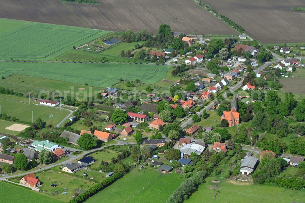 Parum from above - Agricultural land and field boundaries surround the settlement area of the village in Parum in the state Mecklenburg - Western Pomerania, Germany