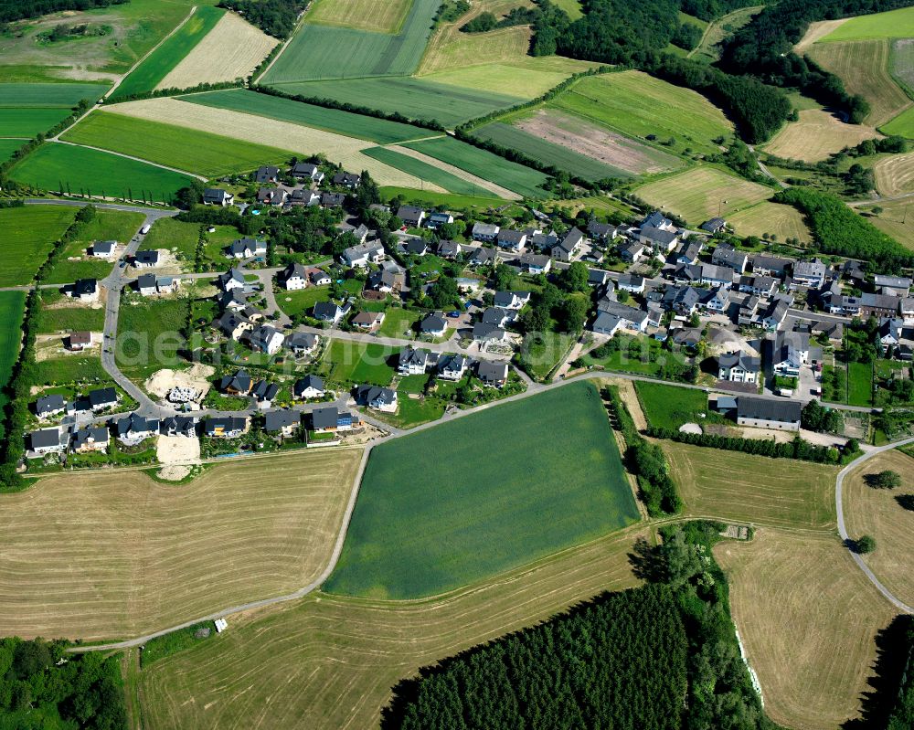 Perscheid from above - Agricultural land and field boundaries surround the settlement area of the village in Perscheid in the state Rhineland-Palatinate, Germany