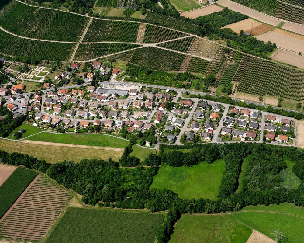 Pfaffenhofen from above - Agricultural land and field boundaries surround the settlement area of the village in Pfaffenhofen in the state Baden-Wuerttemberg, Germany