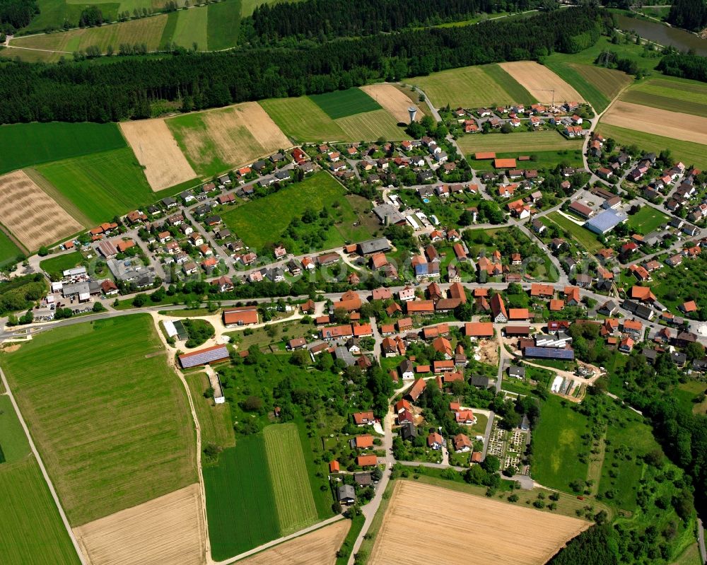 Aerial image Pfahlbronn - Agricultural land and field boundaries surround the settlement area of the village in Pfahlbronn in the state Baden-Wuerttemberg, Germany