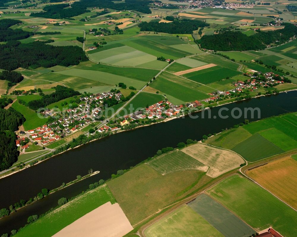 Aerial image Pfelling - Agricultural land and field boundaries surround the settlement area of the village in Pfelling in the state Bavaria, Germany