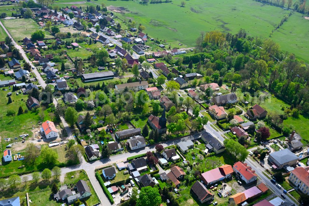 Aerial image Protzen - Agricultural land and field boundaries surround the settlement area of the village in Protzen in the state Brandenburg, Germany