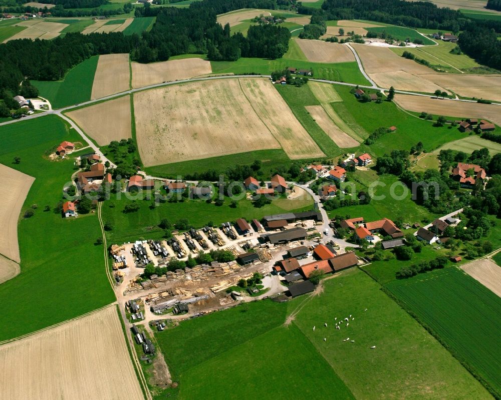 Rabensham from the bird's eye view: Agricultural land and field boundaries surround the settlement area of the village in Rabensham in the state Bavaria, Germany