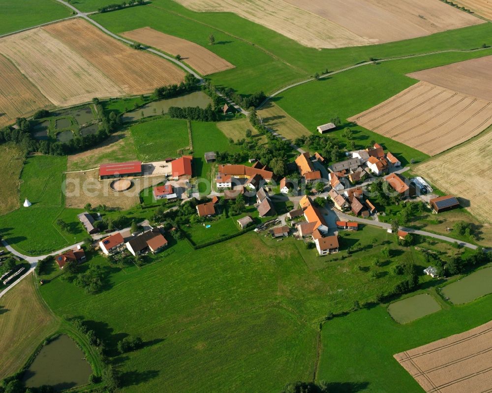 Ransbach An Der Holzecke from above - Agricultural land and field boundaries surround the settlement area of the village in Ransbach An Der Holzecke in the state Bavaria, Germany