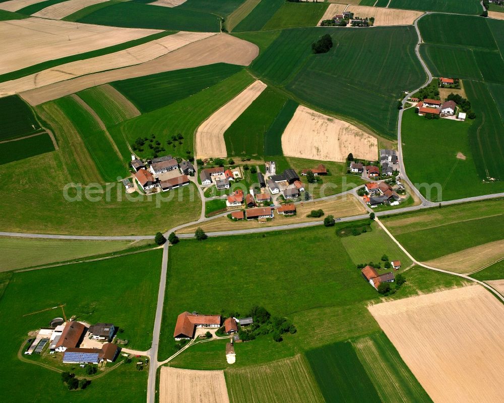 Rattenbach from the bird's eye view: Agricultural land and field boundaries surround the settlement area of the village in Rattenbach in the state Bavaria, Germany