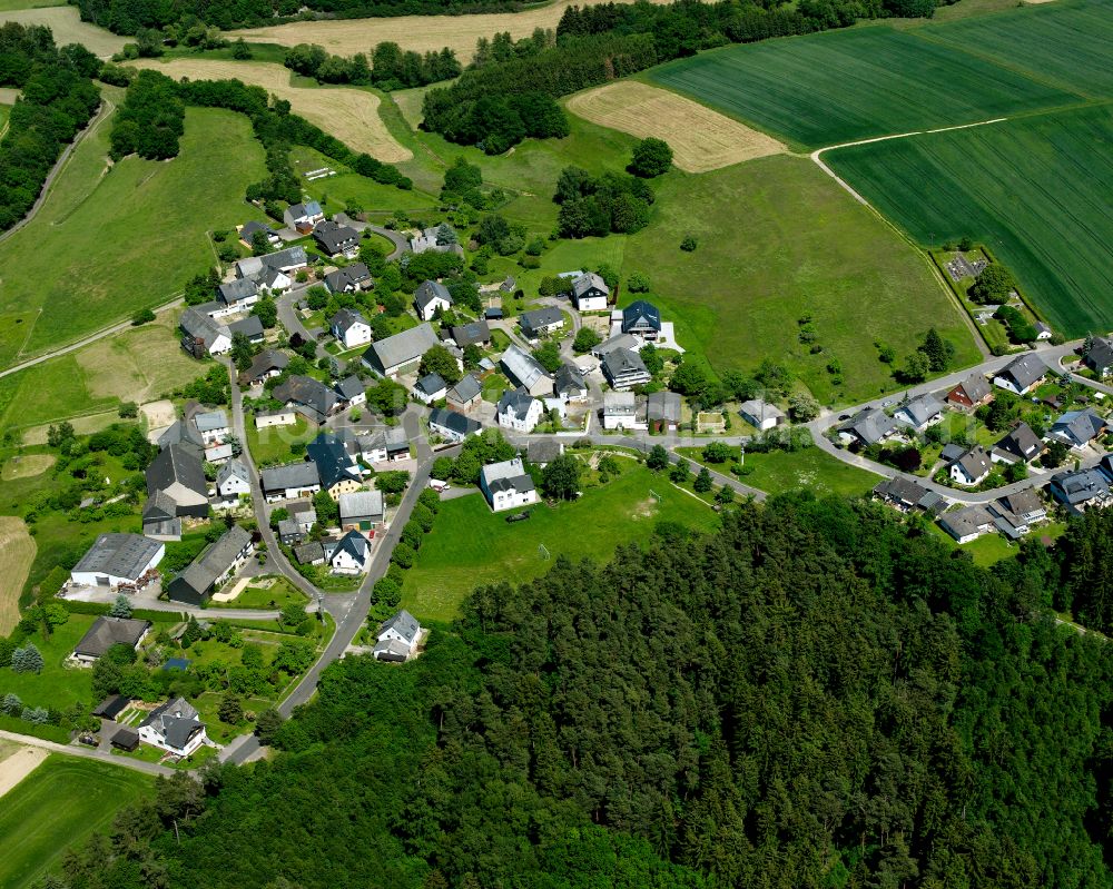 Rödern from above - Agricultural land and field boundaries surround the settlement area of the village in Rödern in the state Rhineland-Palatinate, Germany