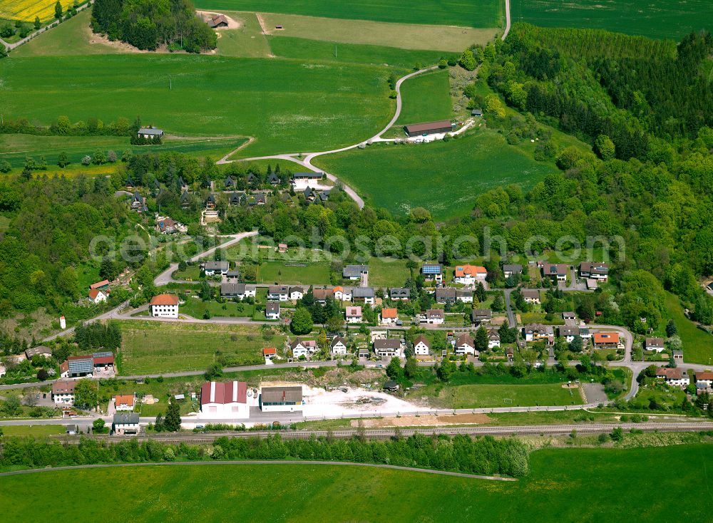 Aerial photograph Rechtenstein - Agricultural land and field boundaries surround the settlement area of the village in Rechtenstein in the state Baden-Wuerttemberg, Germany