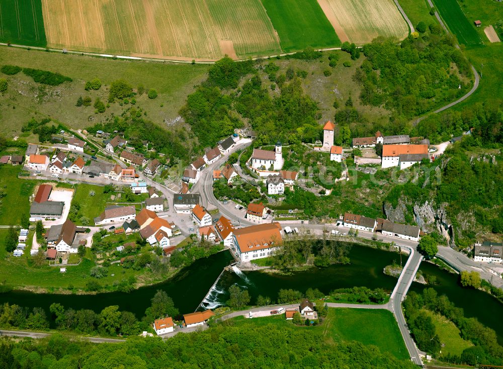 Rechtenstein from above - Agricultural land and field boundaries surround the settlement area of the village in Rechtenstein in the state Baden-Wuerttemberg, Germany