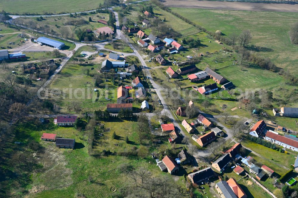 Aerial image Redlin - Agricultural land and field boundaries surround the settlement area of the village in Redlin in the state Mecklenburg - Western Pomerania, Germany