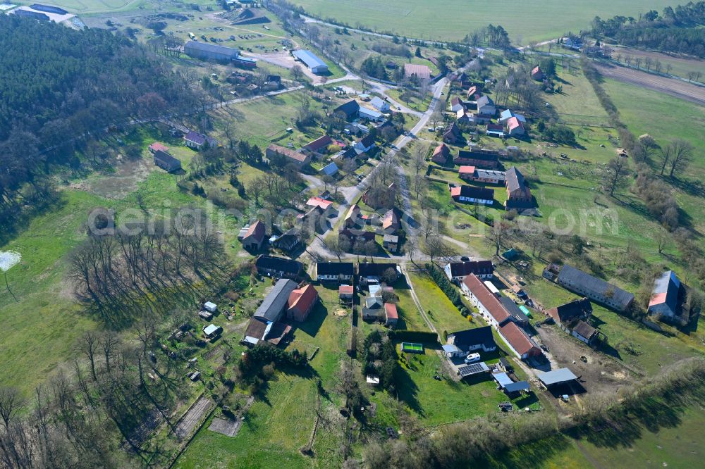 Redlin from the bird's eye view: Agricultural land and field boundaries surround the settlement area of the village in Redlin in the state Mecklenburg - Western Pomerania, Germany