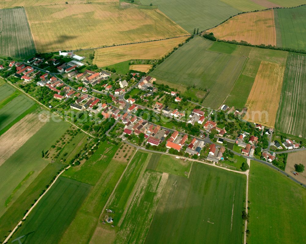 Aerial photograph Reinersdorf - Agricultural land and field boundaries surround the settlement area of the village in Reinersdorf in the state Saxony, Germany