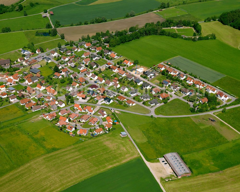 Reinstetten from the bird's eye view: Agricultural land and field boundaries surround the settlement area of the village in Reinstetten in the state Baden-Wuerttemberg, Germany