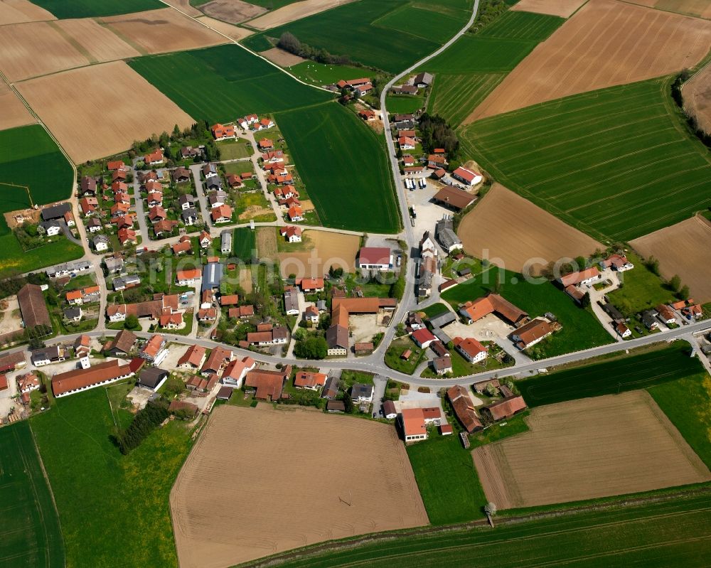 Reißing from the bird's eye view: Agricultural land and field boundaries surround the settlement area of the village in Reißing in the state Bavaria, Germany