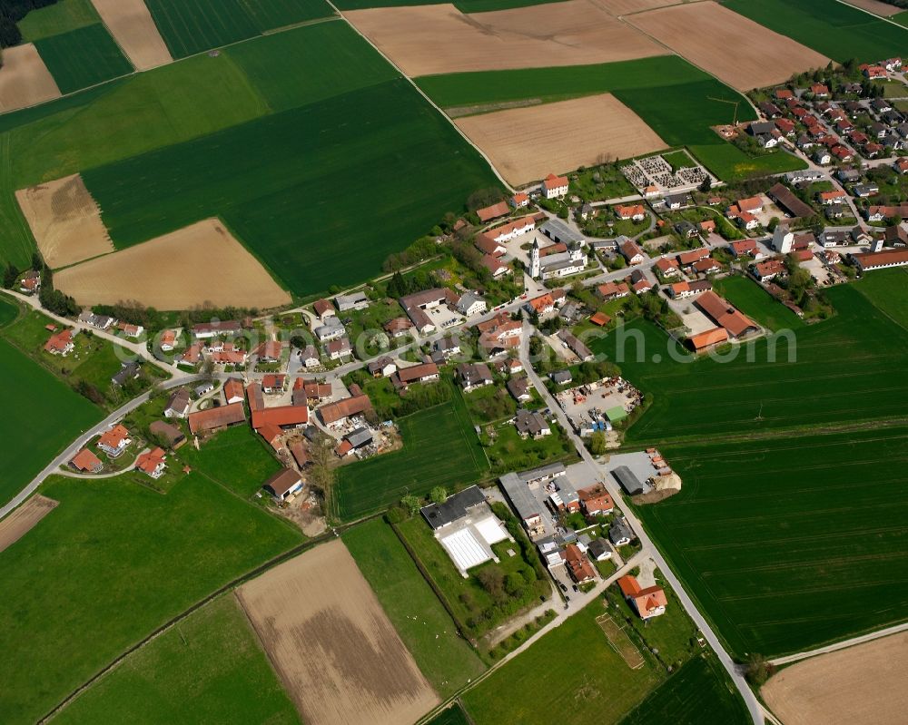 Aerial image Reißing - Agricultural land and field boundaries surround the settlement area of the village in Reißing in the state Bavaria, Germany