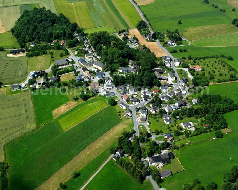 Aerial image Reitzenstein - Agricultural land and field boundaries surround the settlement area of the village in Reitzenstein in the state Bavaria, Germany