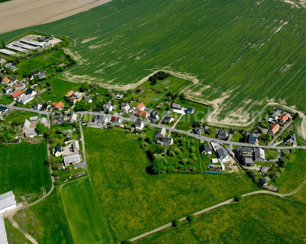 Aerial image Röhrsdorf - Agricultural land and field boundaries surround the settlement area of the village in Röhrsdorf in the state Saxony, Germany