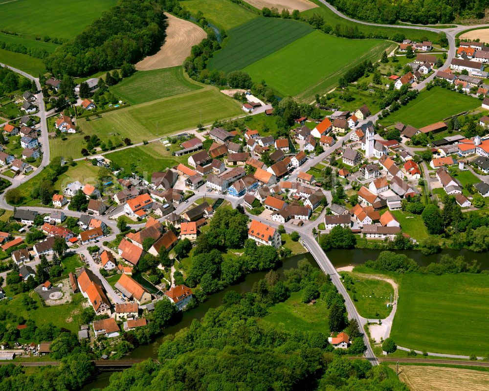 Riedlingen from above - Agricultural land and field boundaries surround the settlement area of the village in Riedlingen in the state Baden-Wuerttemberg, Germany