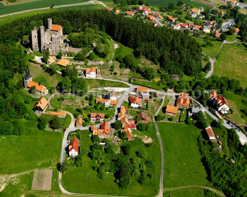 Aerial image Rimbach - Agricultural land and field boundaries surround the settlement area of the village in Rimbach in the state Thuringia, Germany