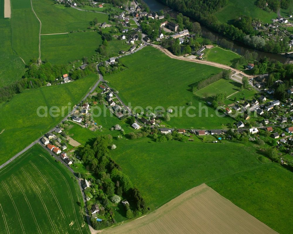 Aerial image Ringethal - Agricultural land and field boundaries surround the settlement area of the village in Ringethal in the state Saxony, Germany