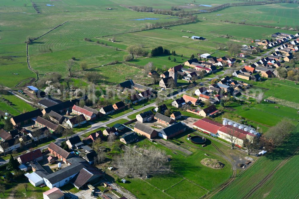 Aerial image Rönnebeck - Agricultural land and field boundaries surround the settlement area of the village on street Roennebecker Strasse in Roennebeck in the state Brandenburg, Germany