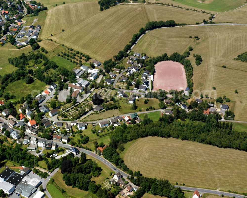 Aerial photograph Rönsahl - Agricultural land and field boundaries surround the settlement area of the village in Rönsahl in the state North Rhine-Westphalia, Germany